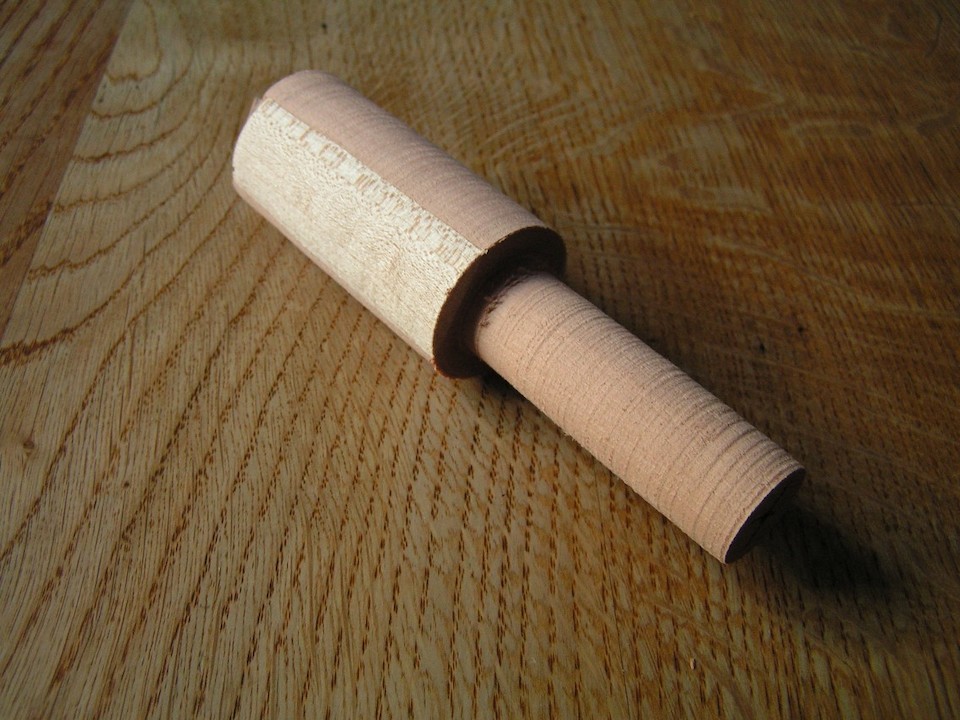 The blank turned round, with the beginnings of a shaft and a head.